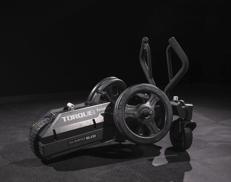 Torque Tank M3 resistance sled angled view featuring dual handles and rugged design. Sold at Fitness Specialist